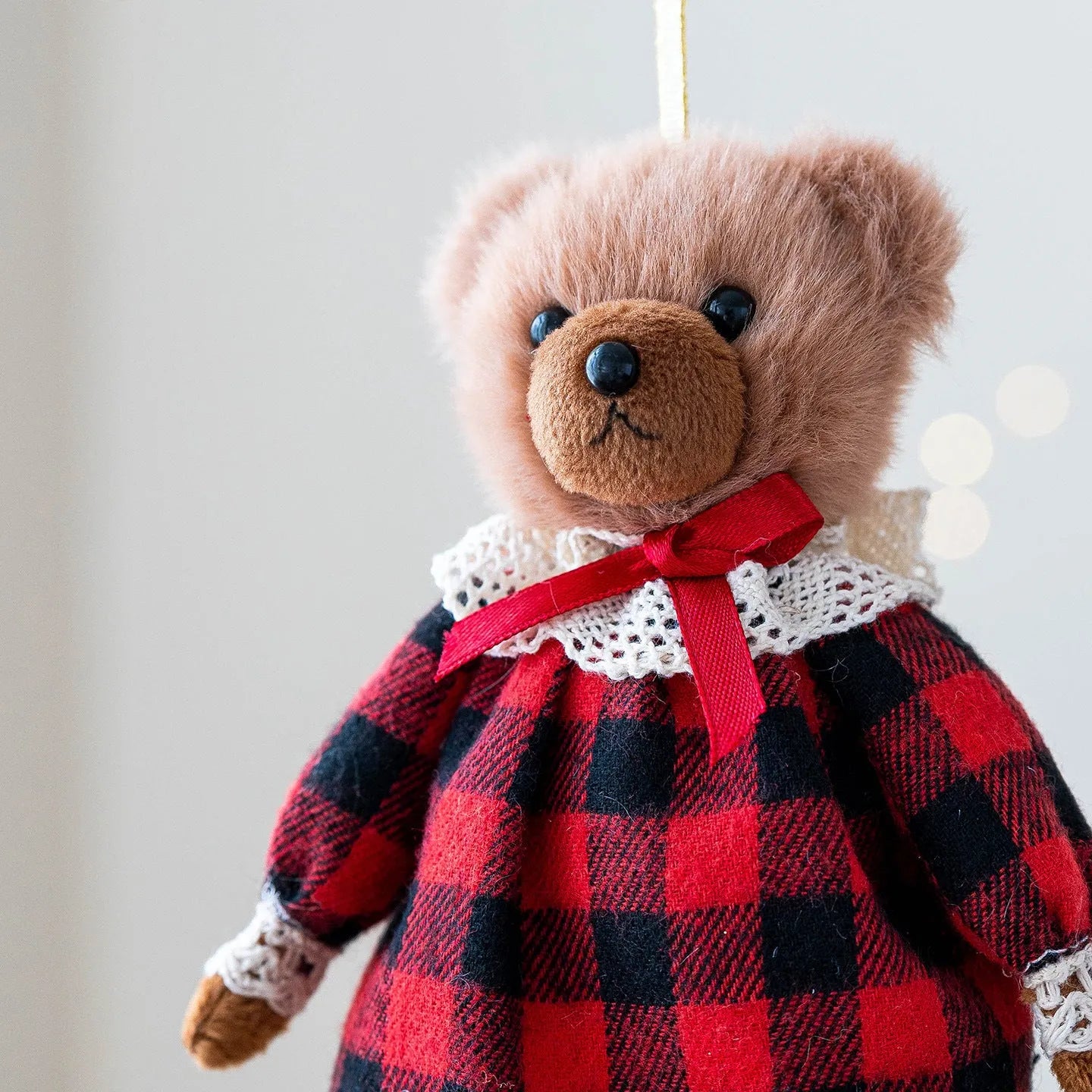 Cartoon plush bear couple in cotton plaid suits - gentleman bear and princess bear characters