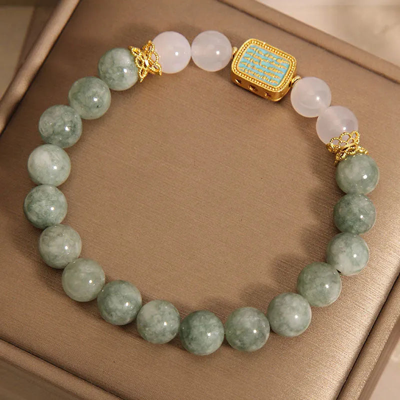 Oil green emerald crystal bracelet for women with five engraved beads.
