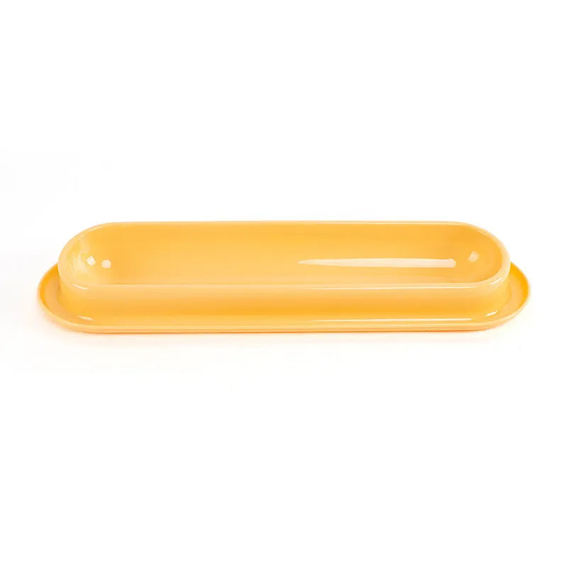 Set of four coloured plastic pet bowls with non-slip rubber bases for cats and dogs.