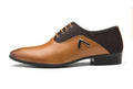 Men's black Oxford shoe with artificial PU leather upper and rubber sole on a white background.
