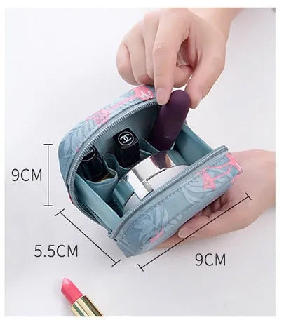 Blue cloth cube makeup storage bag showing cubic shape and plain-patterned material
