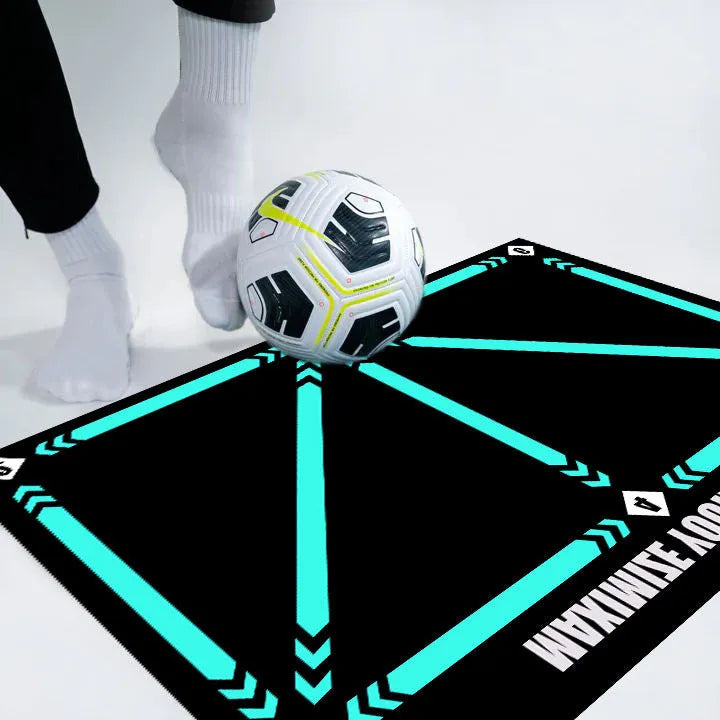 Black rectangular football training mat measuring 60cm by 90cm with non-slip surface