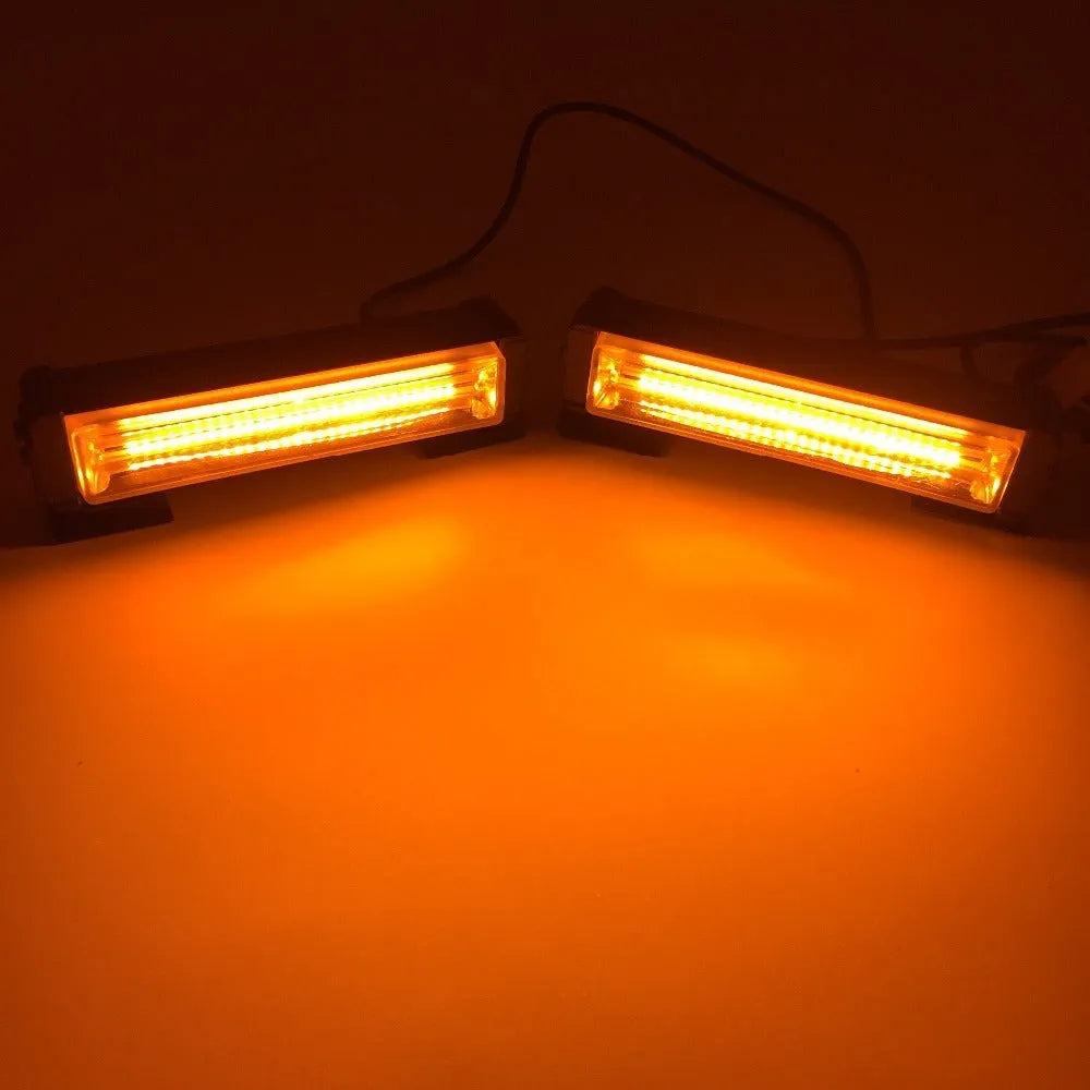 Yellow Model 208 automotive strobe warning light with aluminium alloy frame and clear lens.