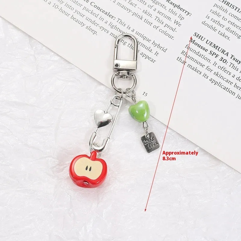 Plastic resin mobile phone charm keychain with fruit designs including apple and strawberry patterns
