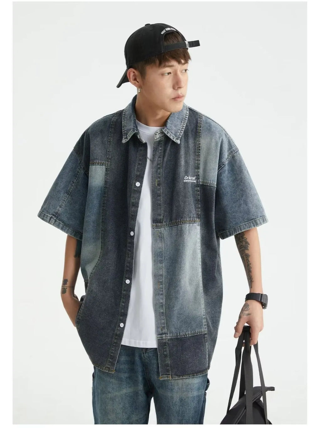 Blue loose-fit men's denim shirt cardigan with retro washed stitching on a hanger.