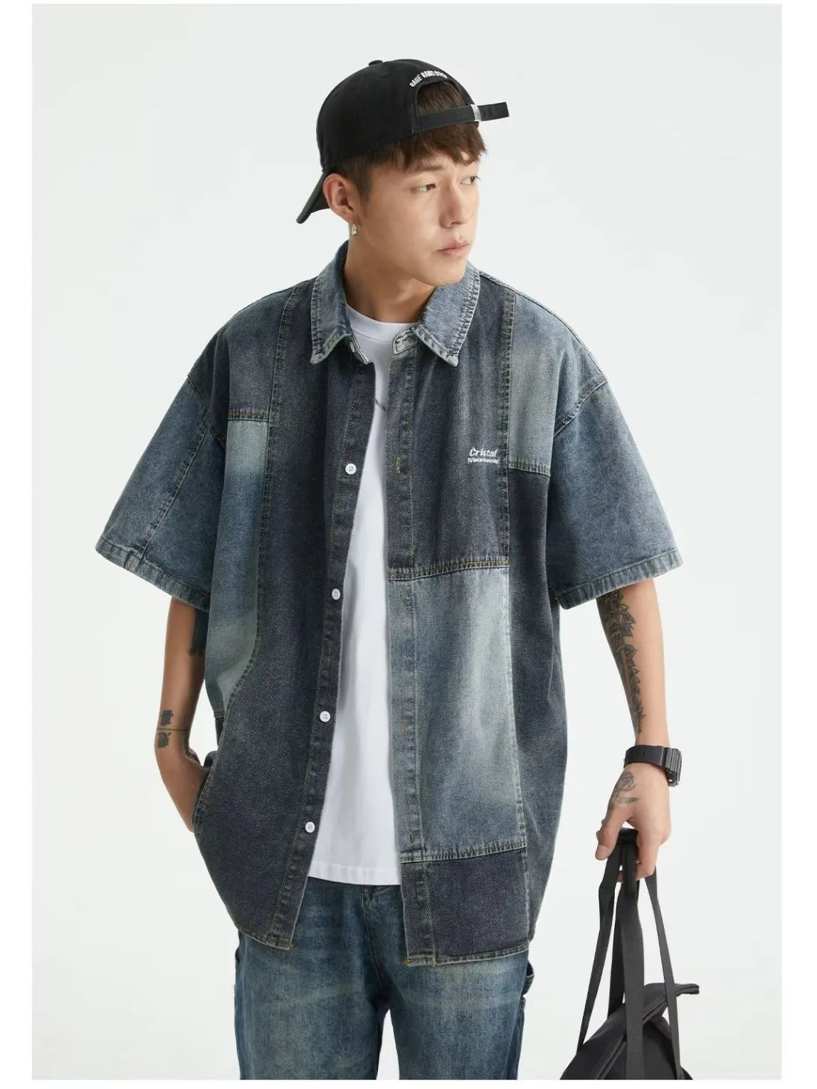 Blue loose-fit men's denim shirt cardigan with retro washed stitching on a hanger.