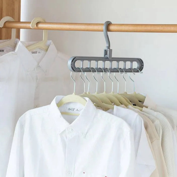 Plastic clothes hanger hook with rotating handle in various colours including pink and green.