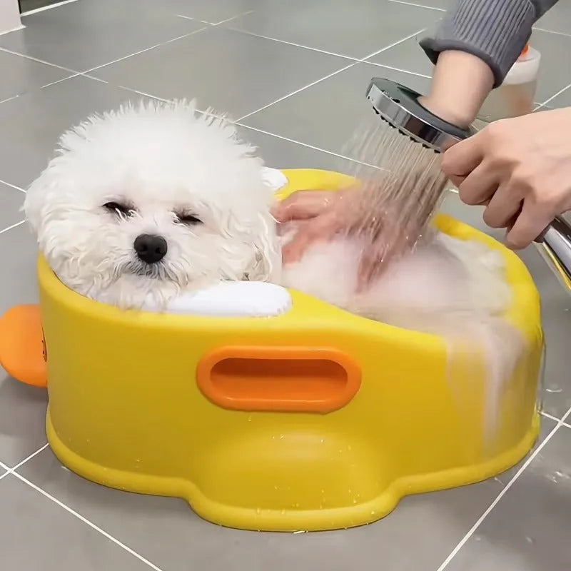 Blue duck-shaped PVC bathtub for washing a small dog or cat, non-electric and portable.