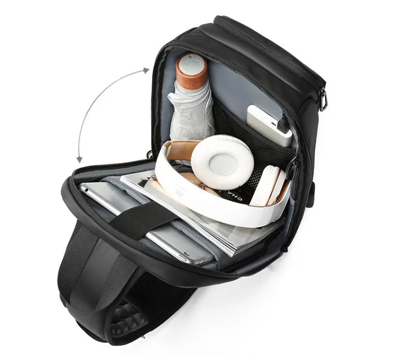 Black PVC outdoor leisure shoulder bag with air cushion strap showing organisational pockets