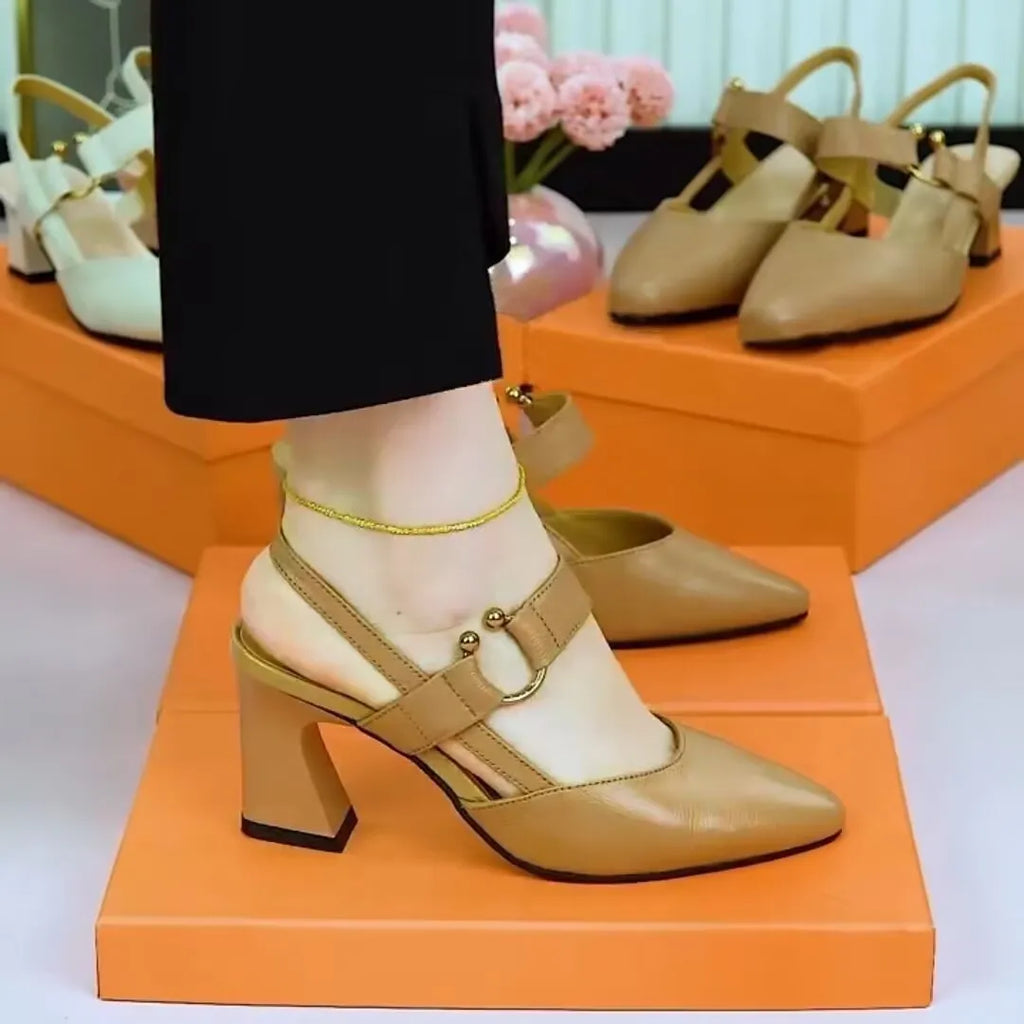 Women's apricot coloured closed toe leather sandals with a chunky block heel.