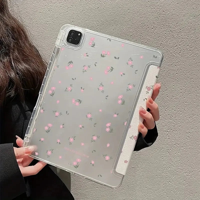 Transparent floral tri-fold iPad protective case with built-in stand, shown closed with magnetic clasp.