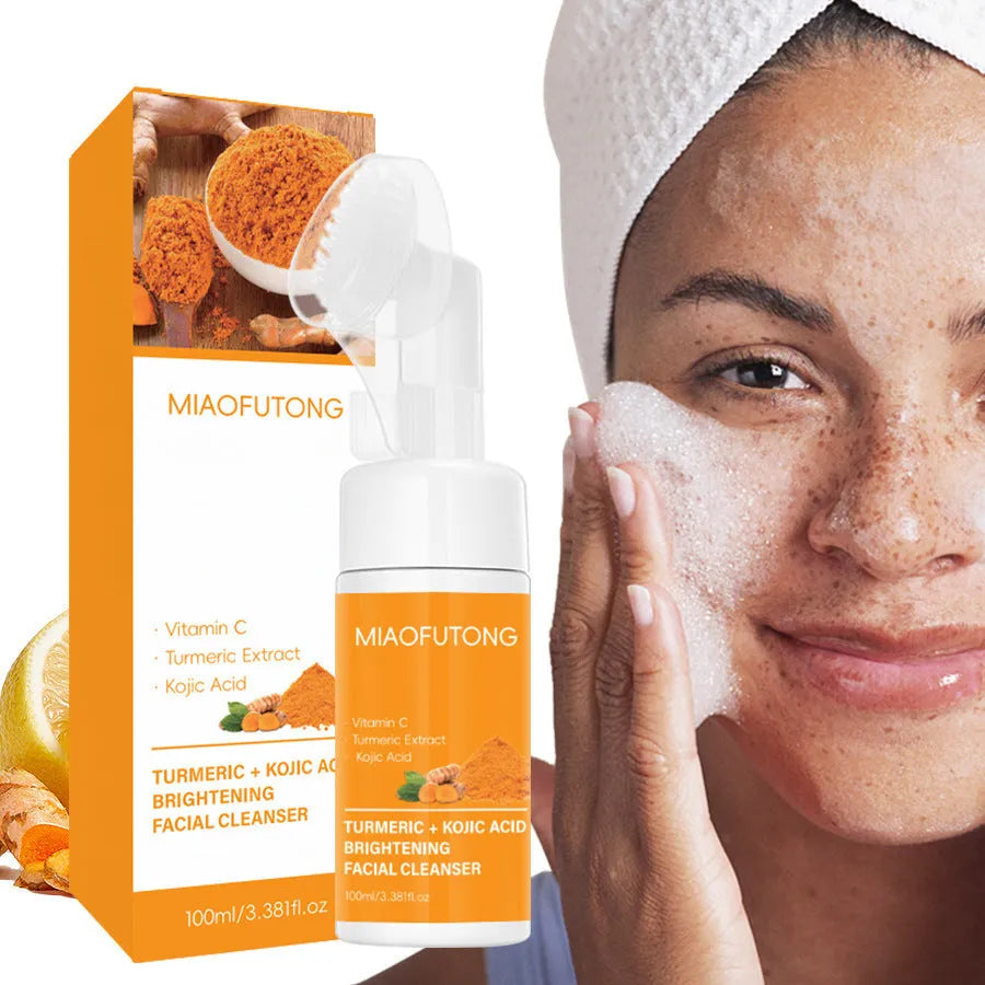 Turmeric and Ginger Facial Cleansing Set showing cleansing pads, soap pieces, and mousse bottle.