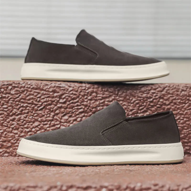 Men's slip-on casual shoes in apricot with round toe, sewing detail, and a mid-height rubber sole.