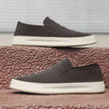 Men's slip-on casual shoes in apricot with round toe, sewing detail, and a mid-height rubber sole.
