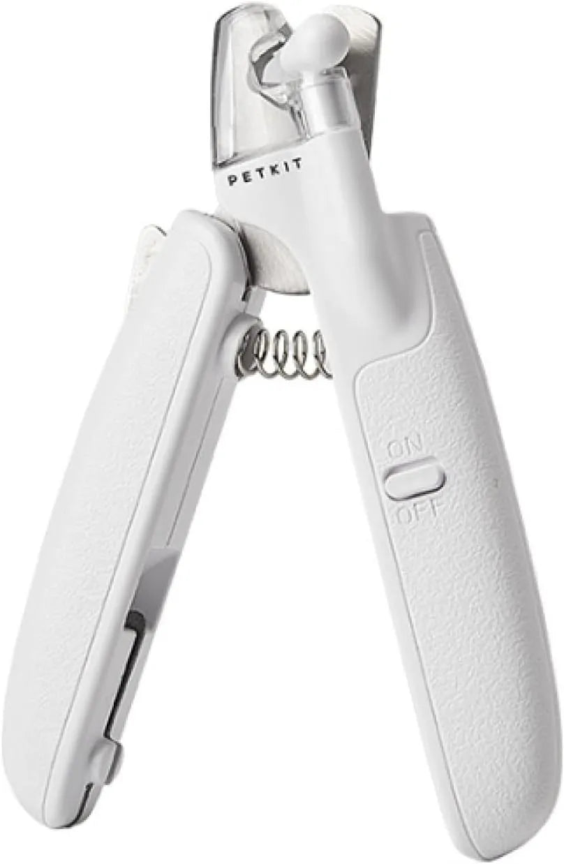 White pet nail clipper with LED light on handle and transparent anti-splash guard surrounding the blades.