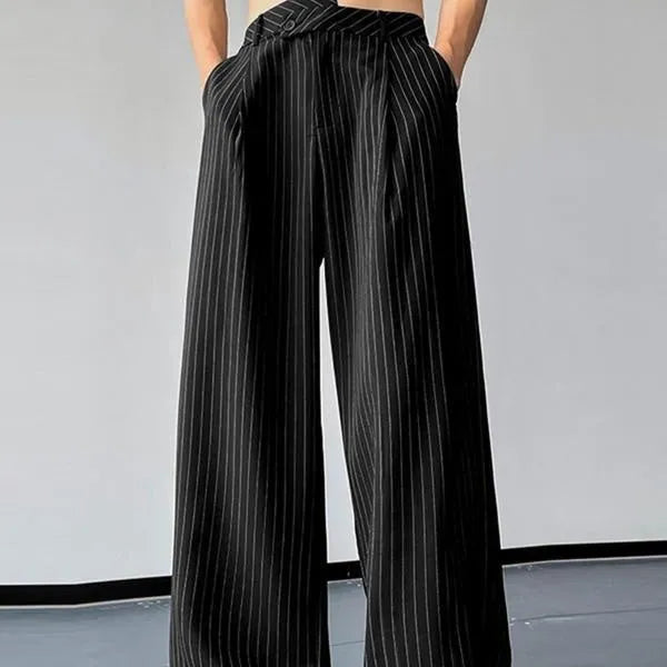 Men's black vertical striped pleated casual trousers with high elasticity fabric, laid flat.