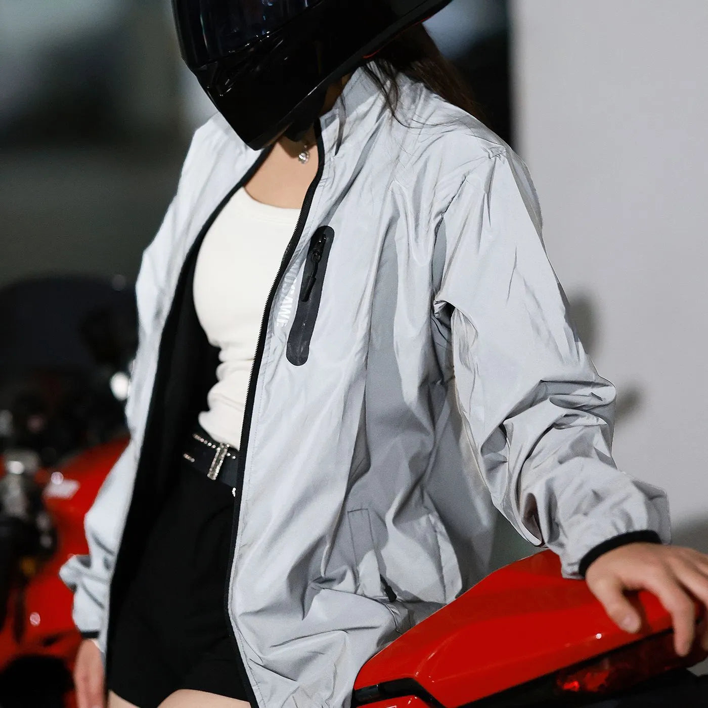 Silver waterproof polyester jacket with long sleeves shown in European sizes from S to 3XL