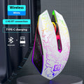 Black and white wireless gaming mouse with breathing lights and USB charging cable on desktop
