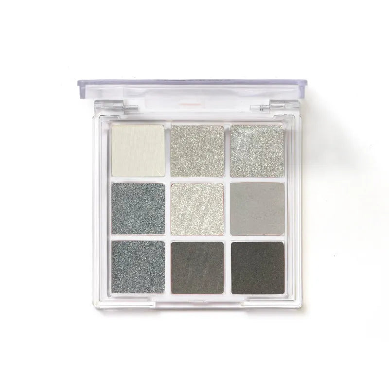 Smoked design nine-colour eye shadow palette showing white, silver, black, and iron grey shades