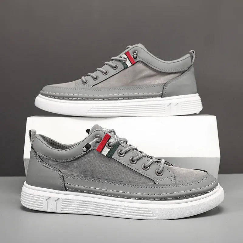Men's grey high-top casual sneakers with round toe and PVC sole on a white background.
