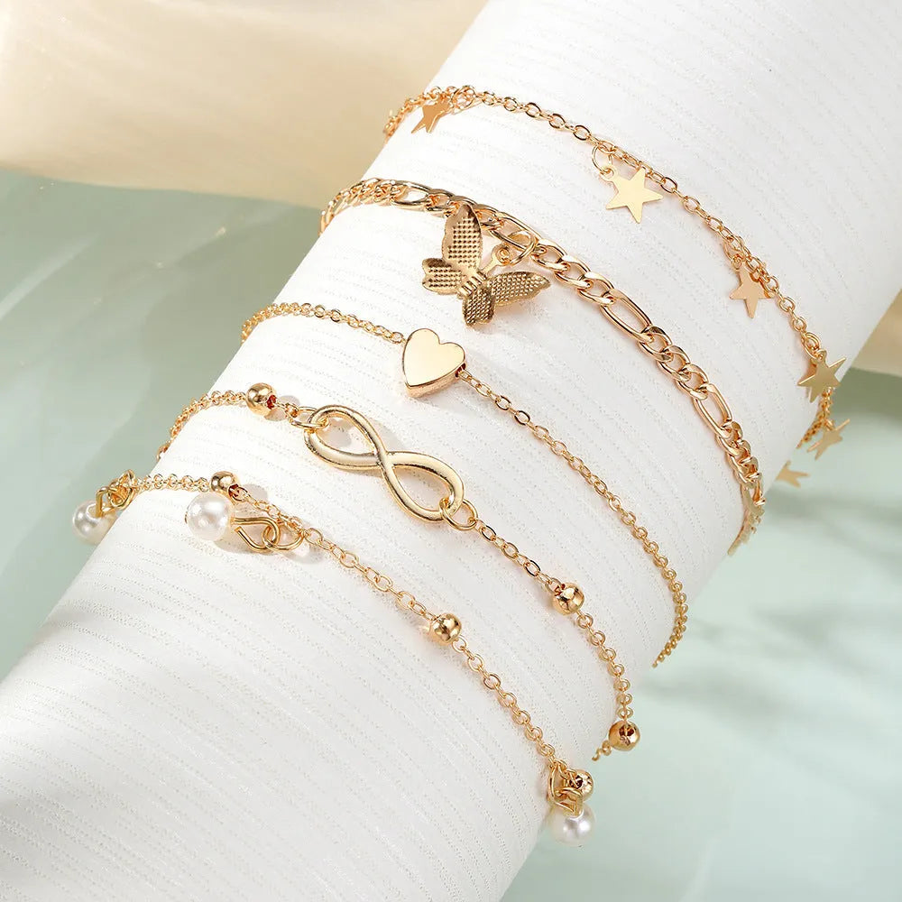 Four-piece butterfly pearl heart anklet set with alloy multi-layered foot chain jewellery