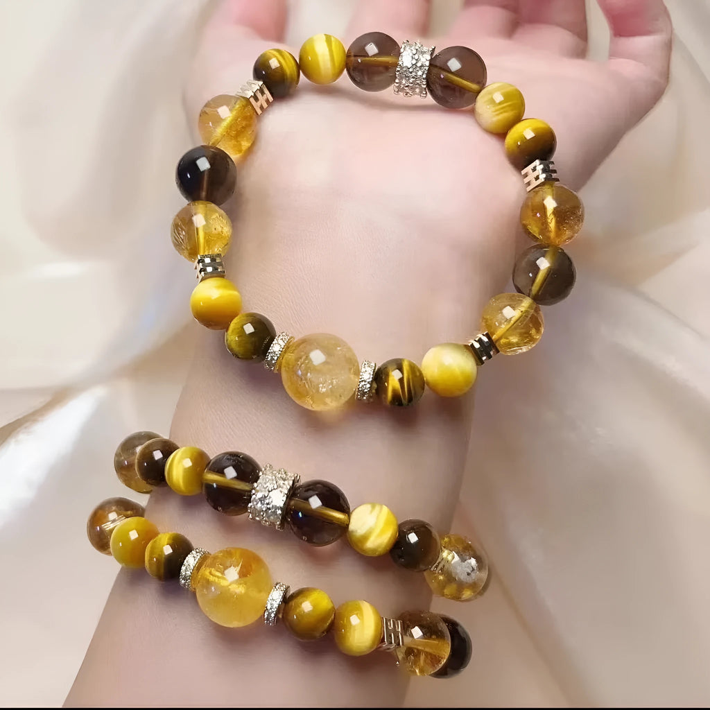 Natural yellow 10mm Jinba crystal beads on a handmade wrap bracelet.