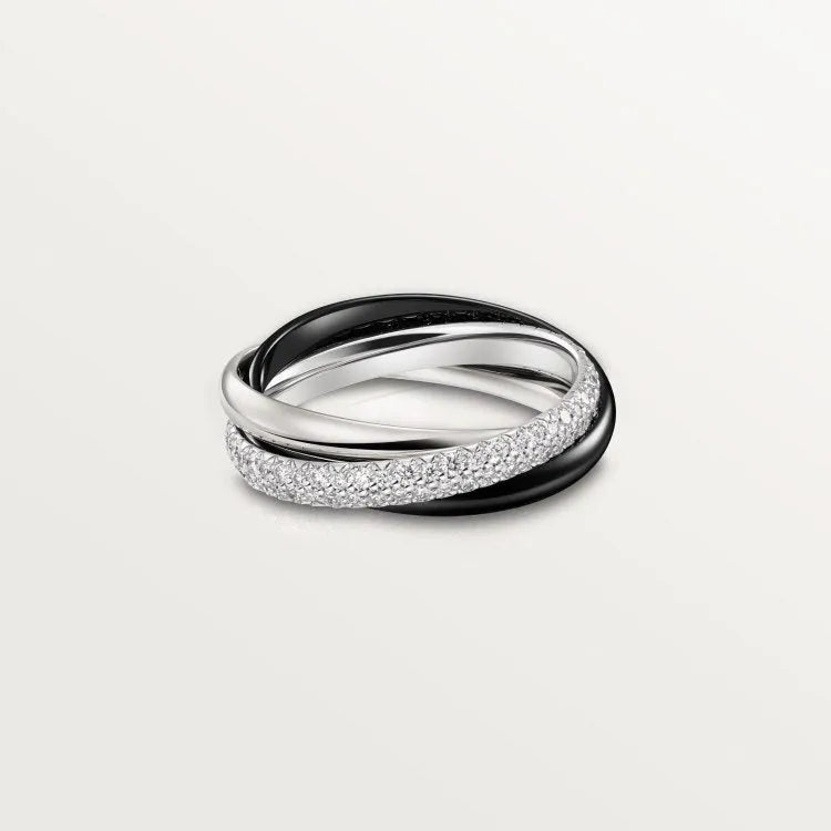 Geometric U-shaped sterling silver couple's ring in gold rose silver with full diamond setting on a size guide.