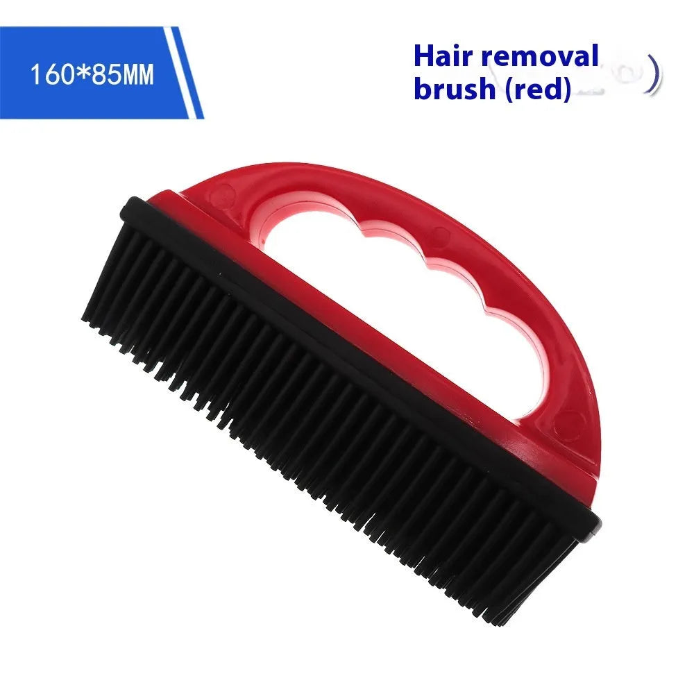 Red pet hair removal brush with silicone bristles and ergonomic handle on a white background.