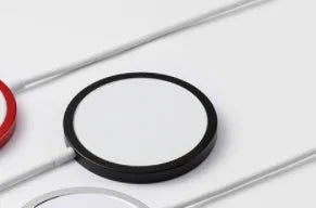 Magsafe magnetic wireless charger for iPhone 12 and 13 in silver, black, blue, or red metal finish