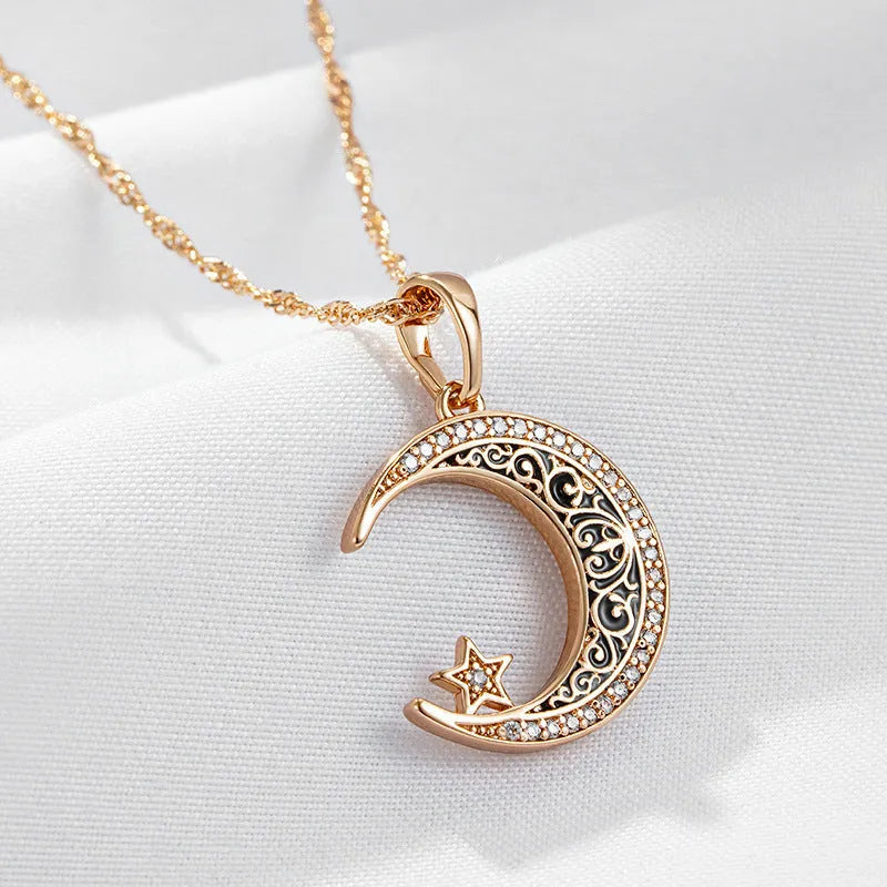 Rose gold necklace with zircon star moon pendant and enamel detailing on adjustable water wave chain