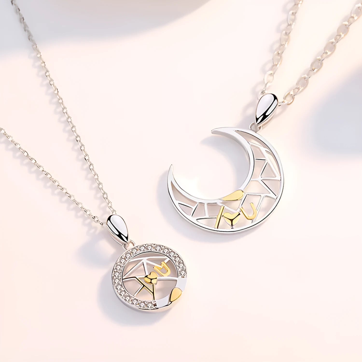 Sun and moon couple necklace set with electroplated copper pendants on cross chain