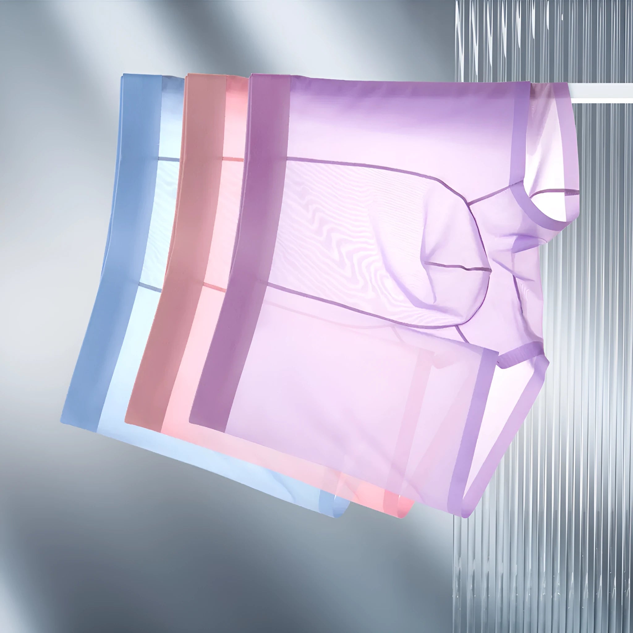 Ice silk seamless boxer briefs for men in solid colours showing ultra-thin transparent fabric