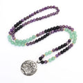 Yoga lotus pendant necklace and bracelet set with stone beads and geometric alloy pendant on adjustable chain.