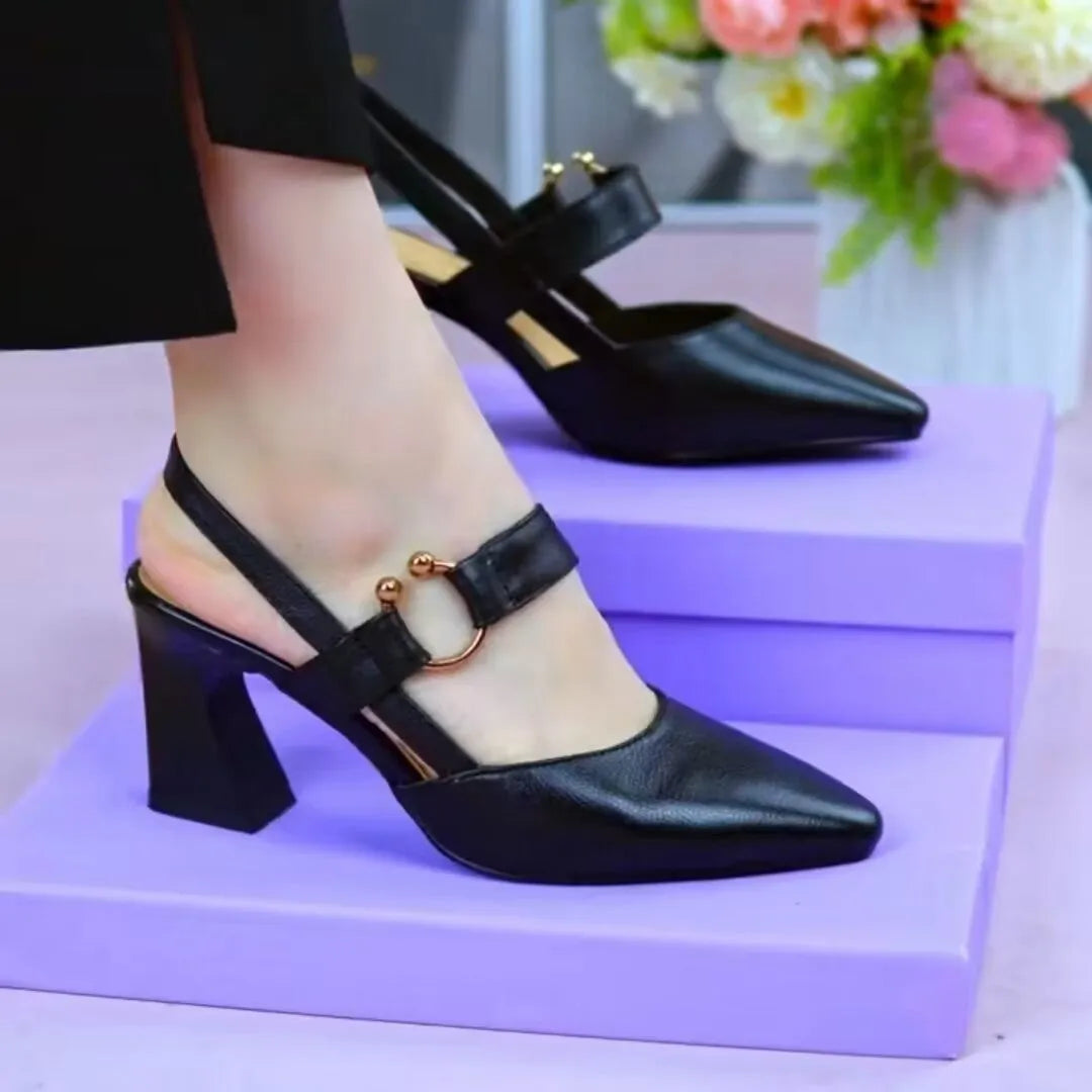 Women's apricot coloured closed toe leather sandals with a chunky block heel.