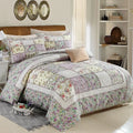 Washed pure cotton quilted bedspread and pillowcases three-piece bedding set on a bed.
