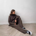 Women's side-slit sweater suit set with matching trousers in acrylic fabric