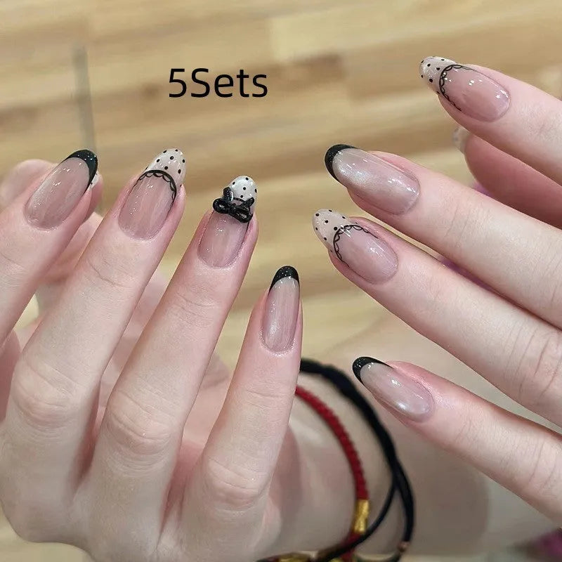 Set of assorted colourful fake nails for girls, showing multiple sets for dress-up play.