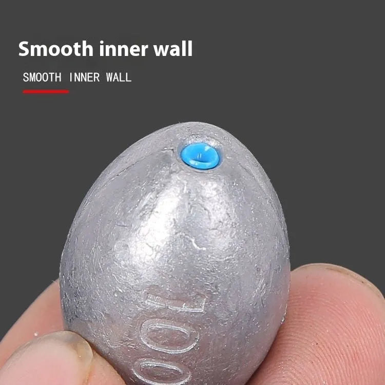 Rugby-shaped olive green lead fishing sinker with plastic core, shown with weight options from 10g to 150g.