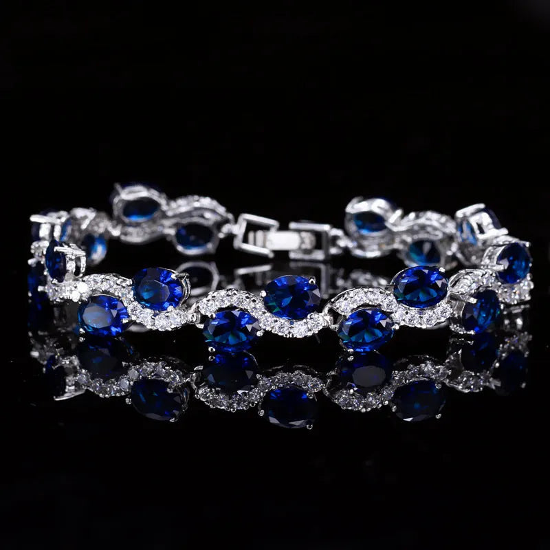 Copper-plated gold colour geometric bracelet with zircon stones in red, green, blue, white or colour options