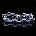 Copper-plated gold colour geometric bracelet with zircon stones in red, green, blue, white or colour options