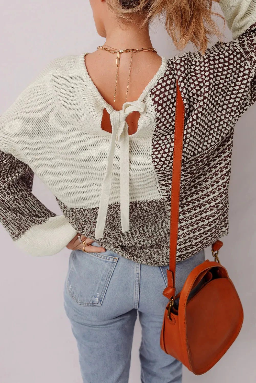 Dark khaki loose-fit sweater with colour block pattern and back tie detail