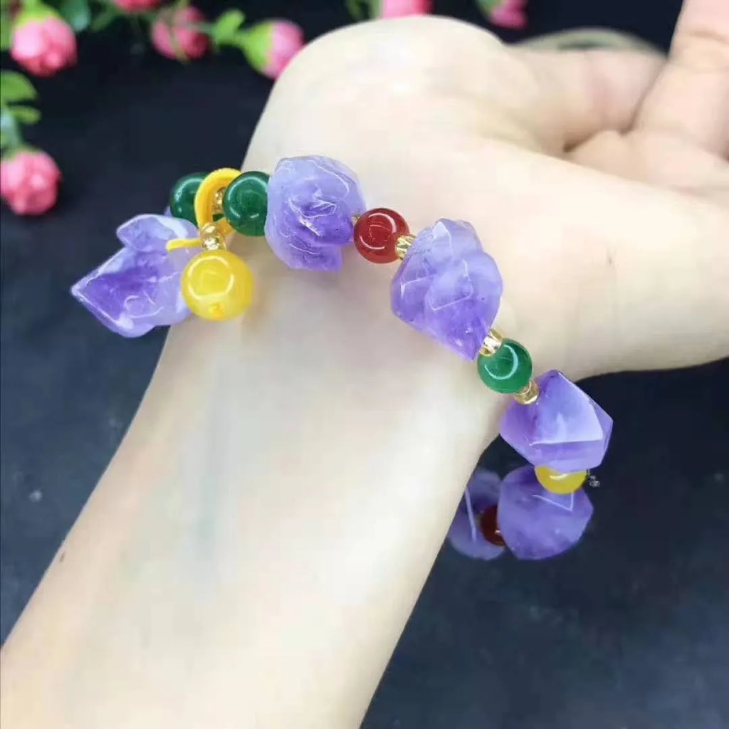 Women's amethyst bead bracelet with natural-shaped stones and fu character charm on adjustable beaded design