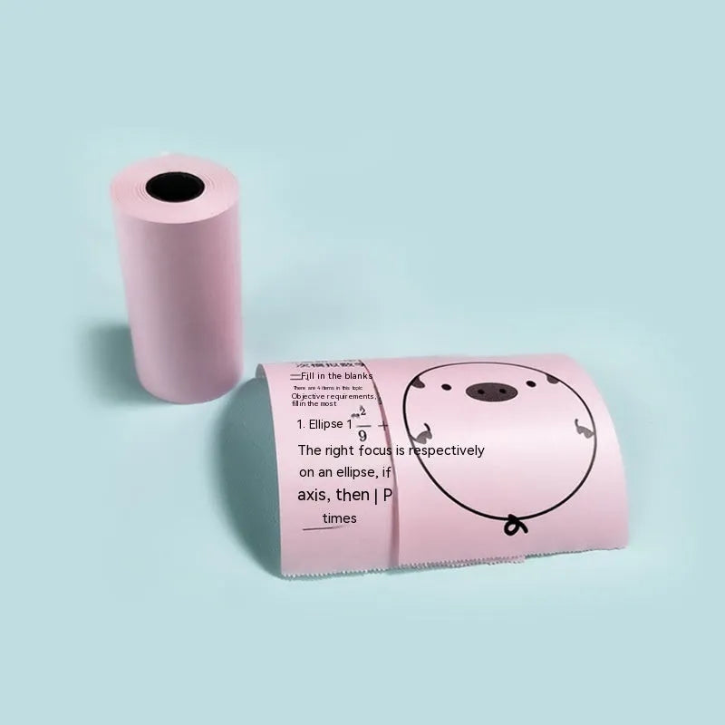 Box of 57x30 mm pink, yellow, and blue thermal paper rolls for receipts and student notebooks