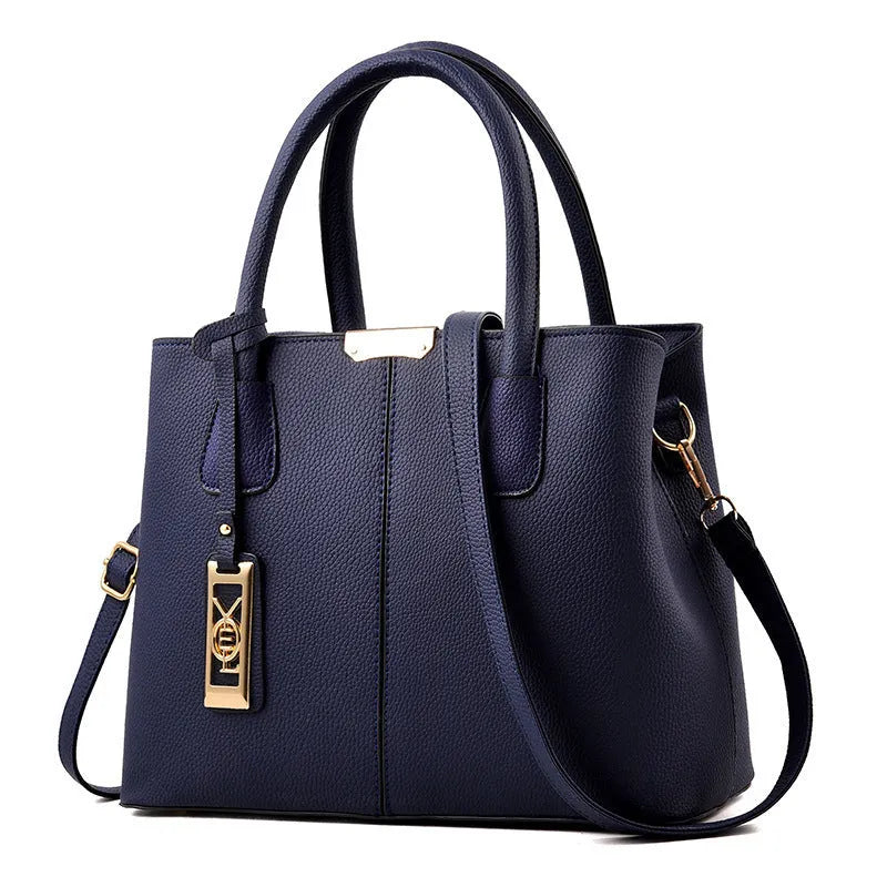 Soft PU women's tote bag in a horizontal square shape with a single leather shoulder strap, shown in a plaid pattern.