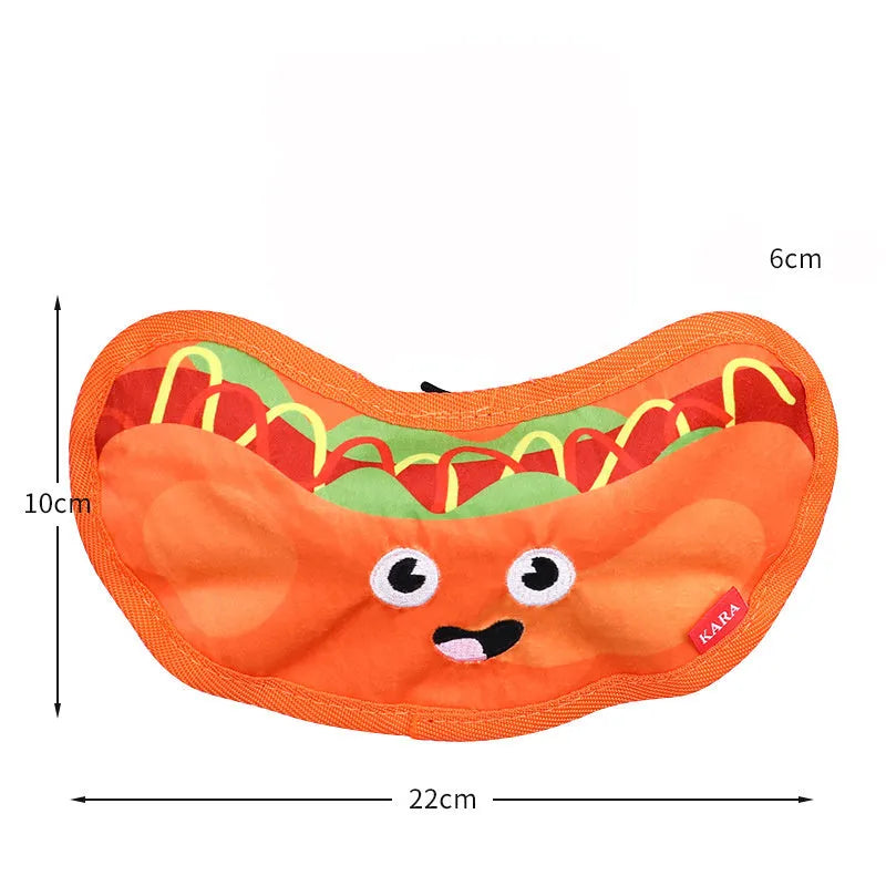A set of four colourful crinkle and squeak dog toys shaped like a burger, fries, a hot dog, and a pizza.