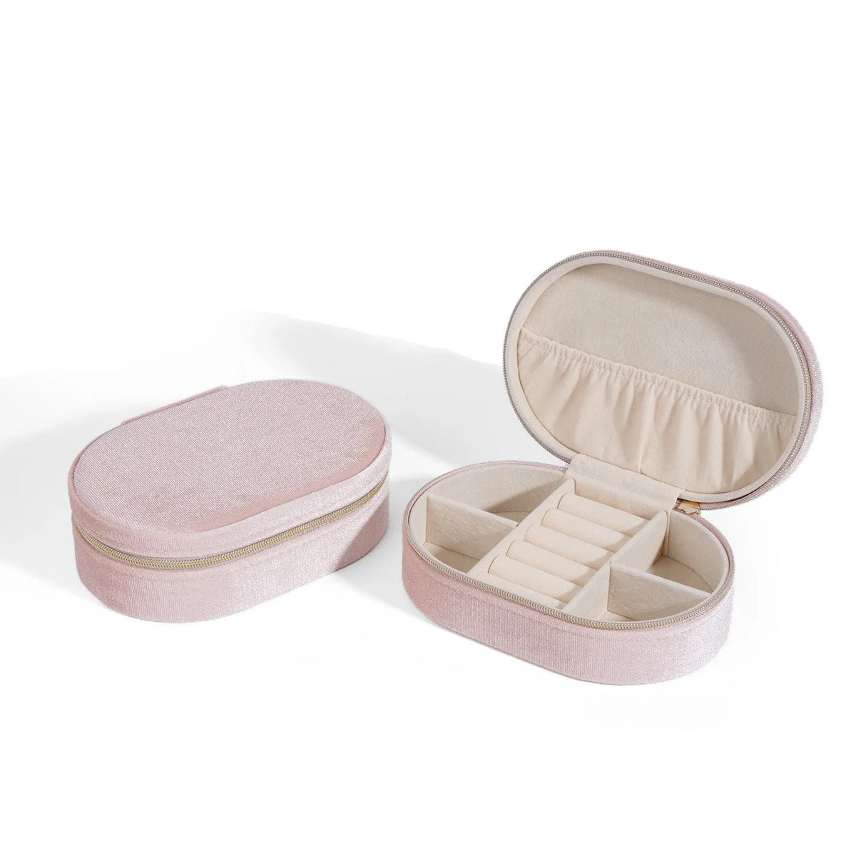 Oval velvet jewellery storage box in lake blue colour, showing soft flannel interior, dimensions 15cm long.
