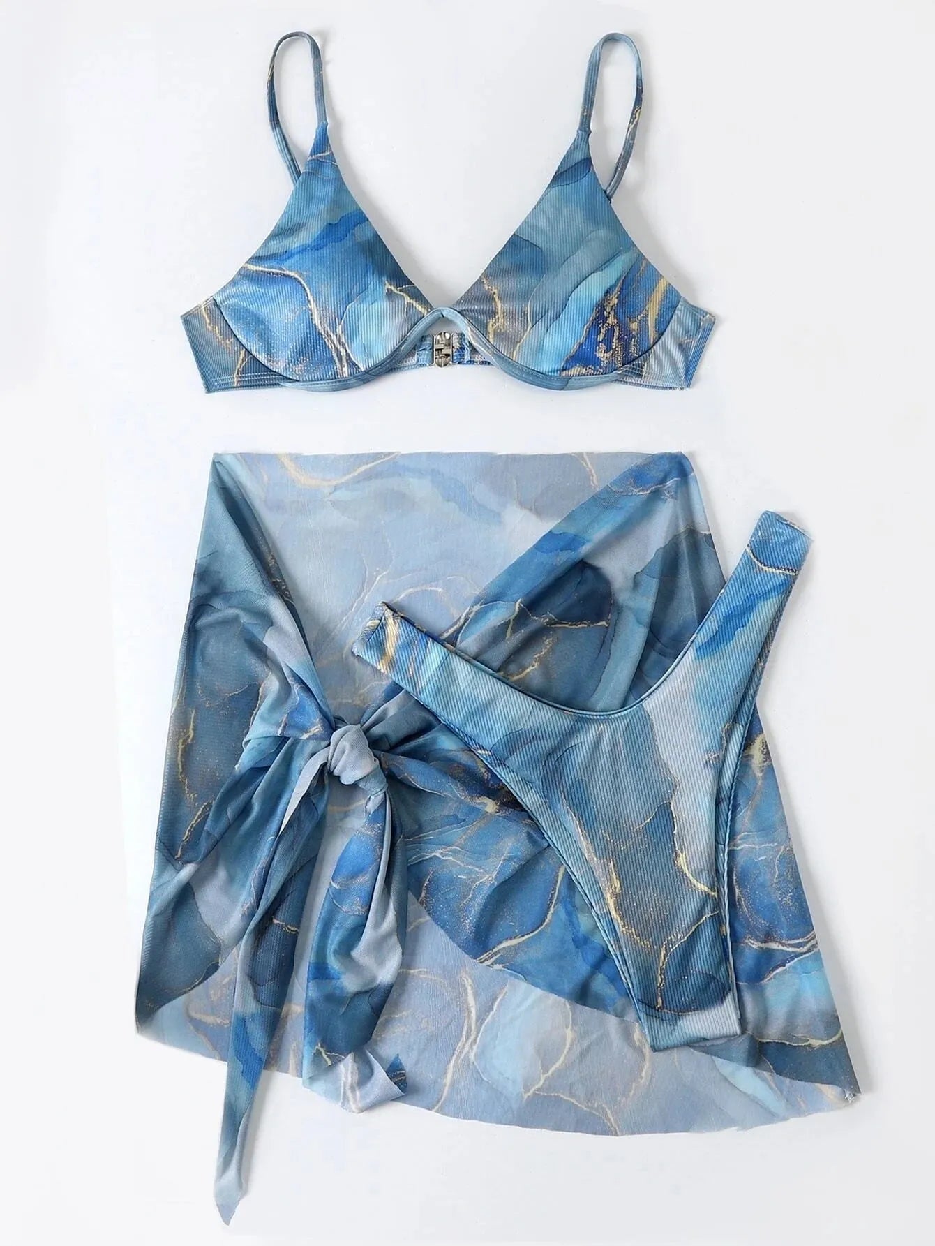 Marble print three-piece bikini swimwear set on a mannequin, showing skirt, bra, and panties.