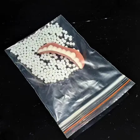 Silicone simulation smile dentures in colour box packaging for dental training