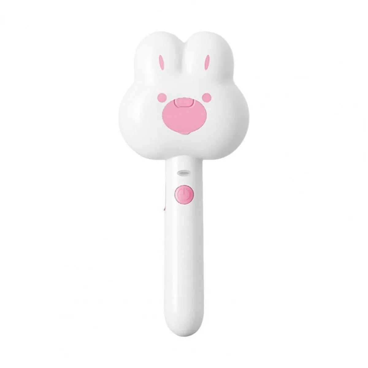 Rechargeable pink cartoon-design steam brush comb for grooming cats and dogs on a table.