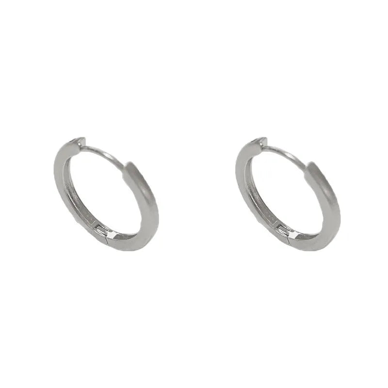 Geometric circular gold plated ear clip for women with eyelet clip mechanism